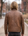 1847 copper brown lamb nappa polish leather jacket with patterned shoulders, zipped pockets and an adjustable waist cinch strap