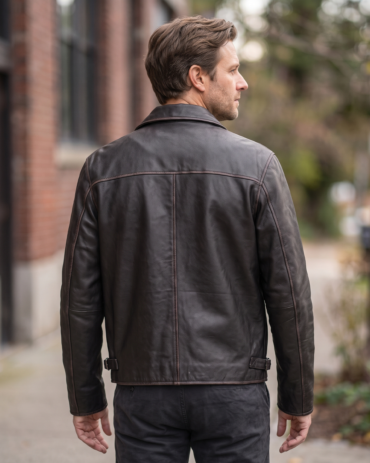 1847 black rubed off goat leather leather jacket with collar, zipped pockets and an adjustable waist cinch strap