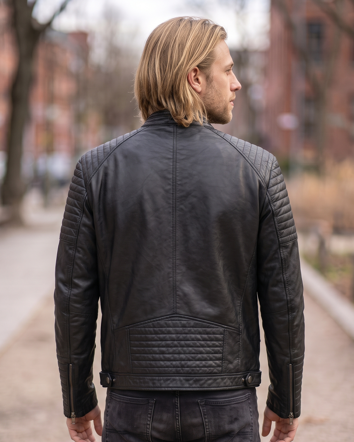 1847 black lamb nappa polish leather jacket with patterned shoulders, zipped pockets and an adjustable waist cinch strap